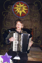 A photo of David playing the accordion