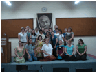 David and his students in front of a picture of Ghandi